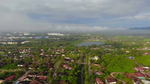 Aerial view of low cloud spread above the lake. Kamunting, Taiping, Perak Stock Footage 209744771