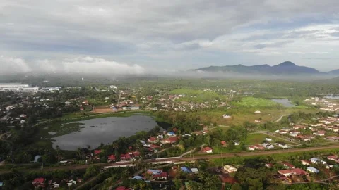 Aerial view of low clouds against Gunung Semanggol, Perak Stock Footage 227858224