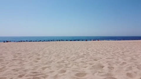 Aerial view of low fly by over beach Stock Footage 160423554