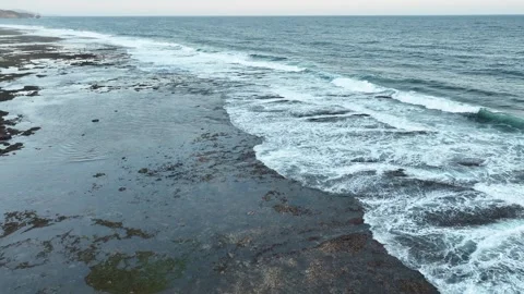 Aerial View of Low tide Beach and Sea with Rocks in Jogja, Indonesia. Stock Footage 244967907