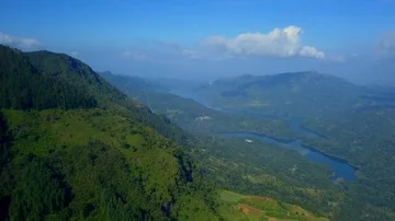Aerial view of lush forest mountains Sri Lanka at sunset drone footage Stock Footage 86151027