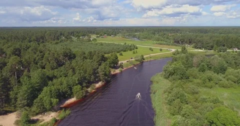 Aerial view of luxury speed boat cruising in the river. Stock Footage