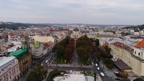 Aerial view of Lviv and central theatre, traffic and people. Ukraine 4k Video stock 88088694