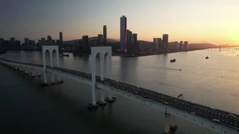 Aerial view of the Macau Tower and Sai Van Bridge city skyline Stock Footage 346687445