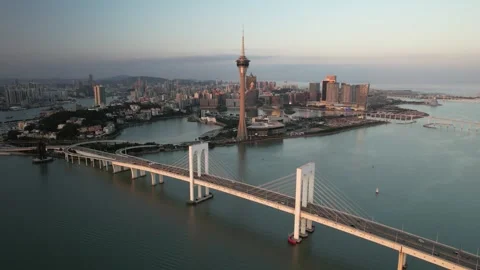Aerial view of the Macau Tower and Sai Van Bridge city skyline Stock Footage 346687459