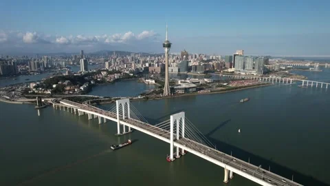 Aerial view of the Macau Tower and Sai Van Bridge city skyline Stock Footage 346688723