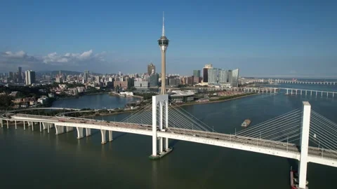Aerial view of the Macau Tower and Sai Van Bridge city skyline Stock Footage 346689117