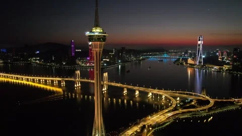 Aerial view of the Macau Tower landmark facing Zhuhai across the sea Stock Footage 346686304