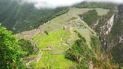 Aerial View of Machu Picchu. Cloudy and Rainy Day Over the Ancient Inca City Stock Footage 277465745