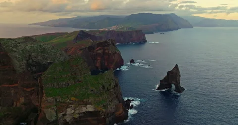 Aerial view Madeira island. The sharp rock in ocean and scenic mountains Stock Footage 266014001