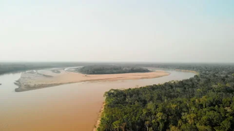 Aerial view Madre de Dios river and amazon rainforest of Tambopata National Park Stockbeeldmateriaal 135555876