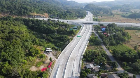 Aerial view of Mae Khaem intersection traffic road in Phrae, Thailand. Stock Footage 209124268