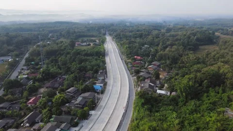 Aerial view of Mae Khaem intersection traffic road in Phrae Stock Footage 209125054