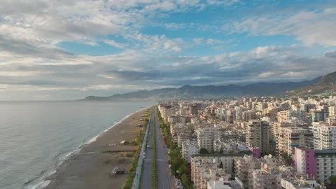 Aerial View: A magical sunset creates a golden atmosphere on the Mediterranean Stock Footage 296041603