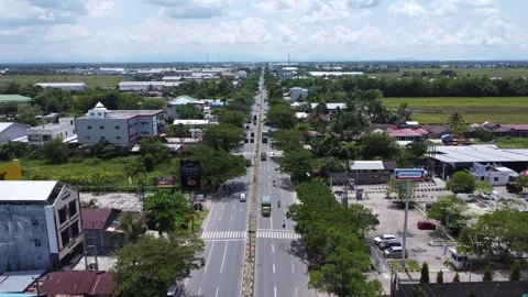 Aerial view of the main road in the warehouse area in Banjarmasin Stock Footage 322081279