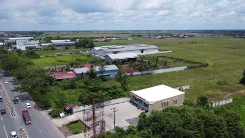 Aerial view of the main road in the warehouse area in Banjarmasin Stock Footage 322081319