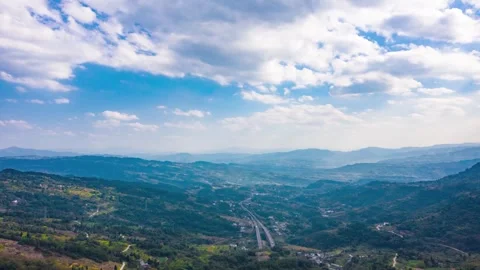 Aerial View of Majestic Mountain Cloud Sea Drifting Through Misty Valleys Stock Footage 341920302