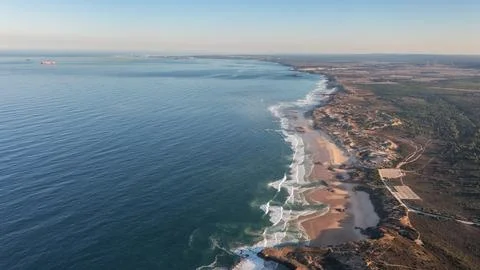 An aerial view of Malhao beach popular for surfing and vacationing tourists Stock Photos