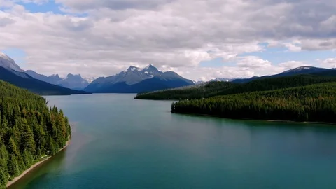 Aerial view of Maligne Lake in the Rocky Mountains of Jasper, Alberta Canada Stock Footage