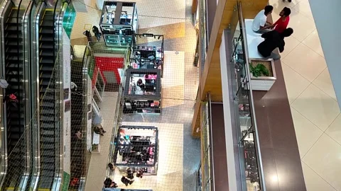 Aerial view of a mall from inside, where people are shopping, relaxing, Stock Footage 204765639