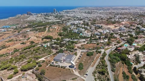 Aerial view of Malta telecom hub with towers, dishes and solar panels. Stock Footage 340110732