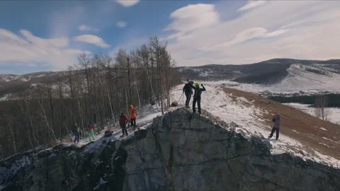 Aerial view of a man jumping off a cliff. Rope jumping. Stock Footage 87912035