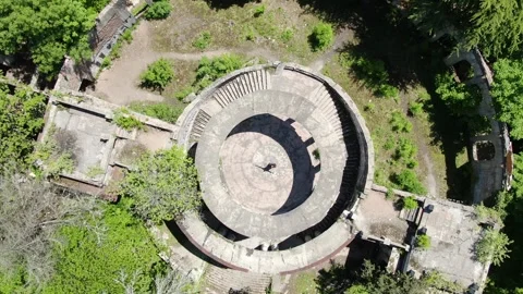 Aerial view of man in the middle of abandoned restaurant on Ahun mount Stock Footage 314817118