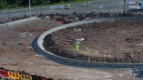 Aerial view of a man on a roundabout Stock Footage 123790254