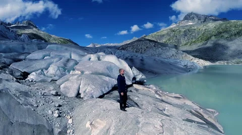 Aerial view of man standing on glacier ice landscape. adventure background Video stock 42255305