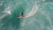 Aerial View Of A Man Sup Stand-Up Paddleboard Surfing In Hawaii, Slow Motion. Stock Footage