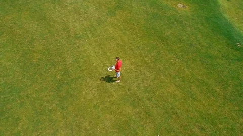 Aerial view of man with virtual reality headset in his hands Stock Footage 114484725