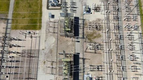 Aerial view managing high voltage power distribution Stock Photos
