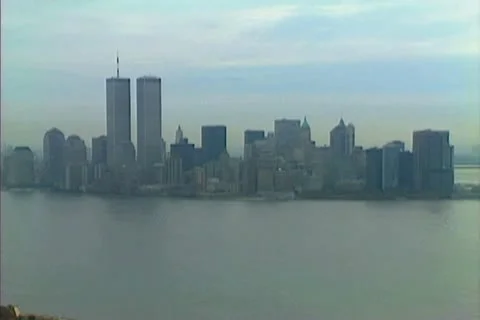 Aerial view of Manhattan with Ellis Island and the twin towers Stock Footage