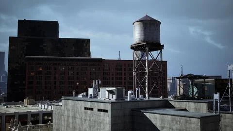 Aerial view of Manhattan rooftops showcasing a water tower perched on top Ilustração Stock