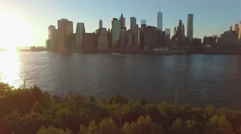 Aerial view of Manhattan at sunset. Camera moves down. Stock Footage 58569464