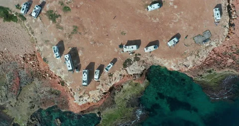 Aerial view of many camper vans on a parking lot. Aerial Footage of Scenic Sea Stock-Footage 133243382