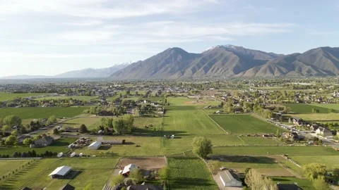 Aerial View Of Mapleton And Spanish Fork Cities In Utah With Wasatch Stock Footage 154384277