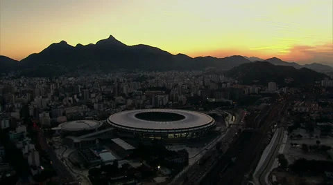 Aerial view of Maracana Stadium and city lights at night, Rio De Janeiro, Brazil Stock Footage
