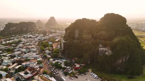 Aerial view of the marble mountains in da nang with ancient pagodas and cit.. 動画素材 335028297