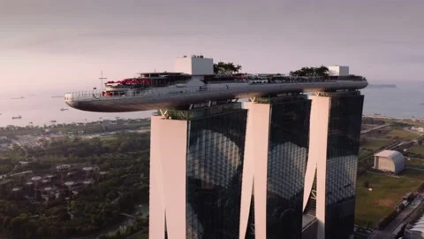 Aerial view of a marina bay sands hotel in singapore in the mornig sunrise Stock Footage