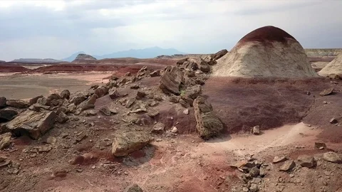 Aerial view of Mars like terrain flying over rocks in the desert Stock Footage 80919859