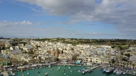 Aerial view of the Marsaxxlok,  fishing village in the South Eastern Malta Stock Footage