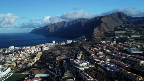 Aerial View of Masca Cliffs, Ocean, and Houses in Tenerife Video stock 308220517