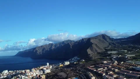 Aerial View of Masca Cliffs, Ocean, and Houses in Tenerife Stock Footage 308220522