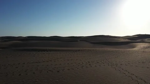Aerial view of Maspalomas Dunes and Lighthouse, Spain. Stock Footage 321483360