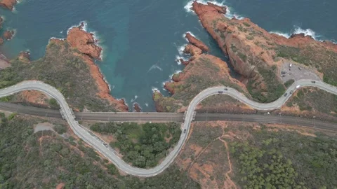 Aerial view of the Massif de L'Esterel  falling into the Mediterranean Sea. Video stock 273232111