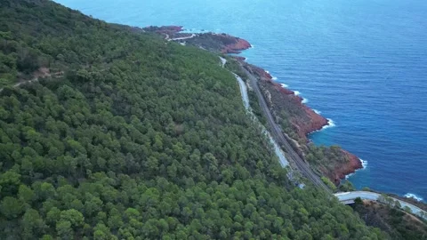 Aerial view of the Massif de L'Esterel falling into the Mediterranean Sea. Stock Footage 273856375