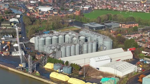 Aerial view of massive agricultural storage silos at the inland port in Boston Stock Footage 335015389
