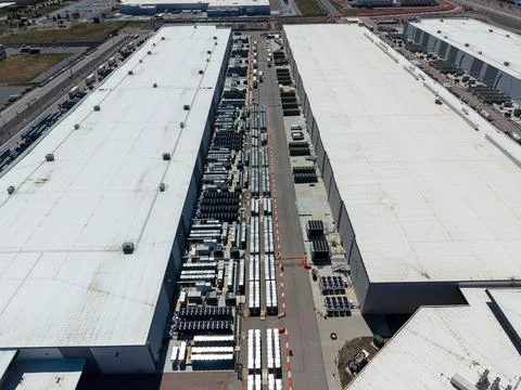 Aerial view of a massive data center facility and cooling systems Stock Photos