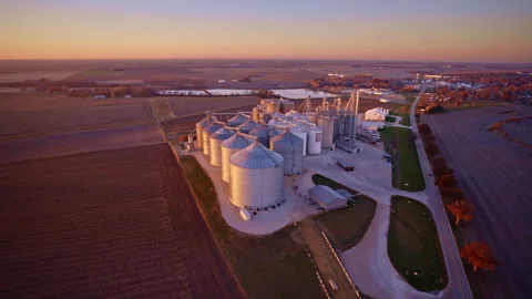 Aerial view of massive grain silos forming an industrial landscape 動画素材 328717572